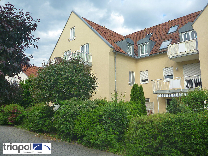 Ruhig und grün gelegene Terrassenwohnung mit Gartenanteil, Laminatboden und Stellplatz in Coswig.
