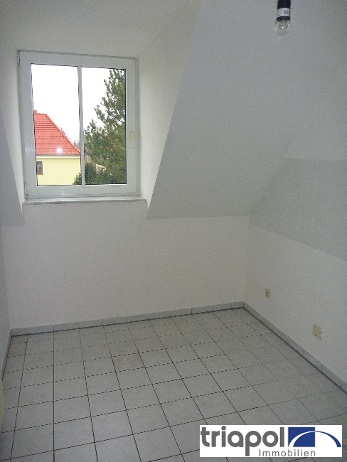 Ruhig gelegene Maisonette-Wohnung mit Balkon im Dachgeschoss.