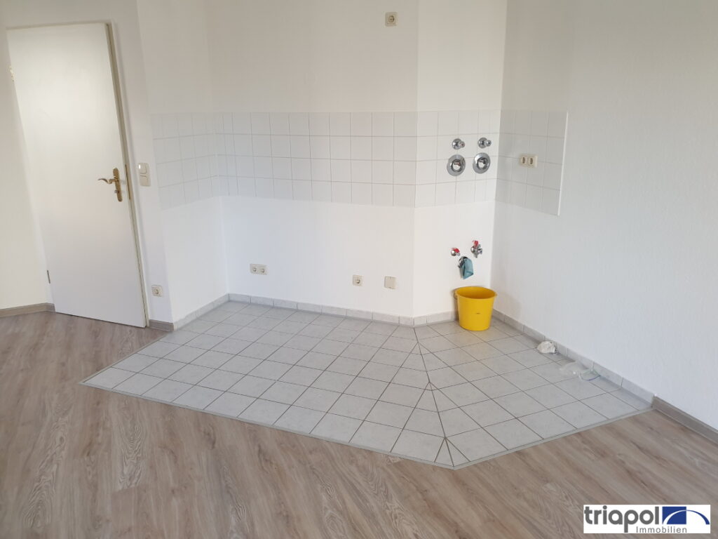 Ruhig und grün gelegene Terrassenwohnung mit Gartenanteil, Laminatboden und Stellplatz in Coswig.
