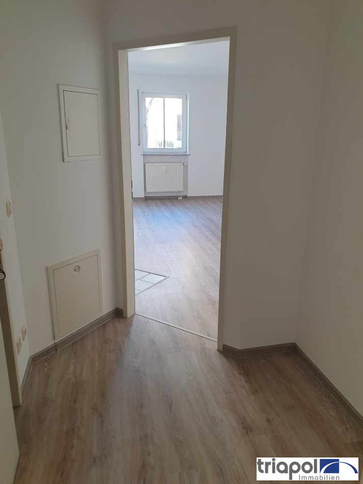 Ruhig und grün gelegene Terrassenwohnung mit Gartenanteil, Laminatboden und Stellplatz in Coswig.