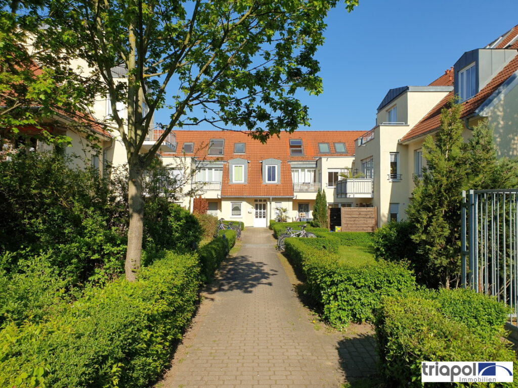 Schöne 2-Zi-Whg. mit TG-Stellplatz, Terrasse und Gartenanteil in grüner und ruhiger Stadtrandlage.