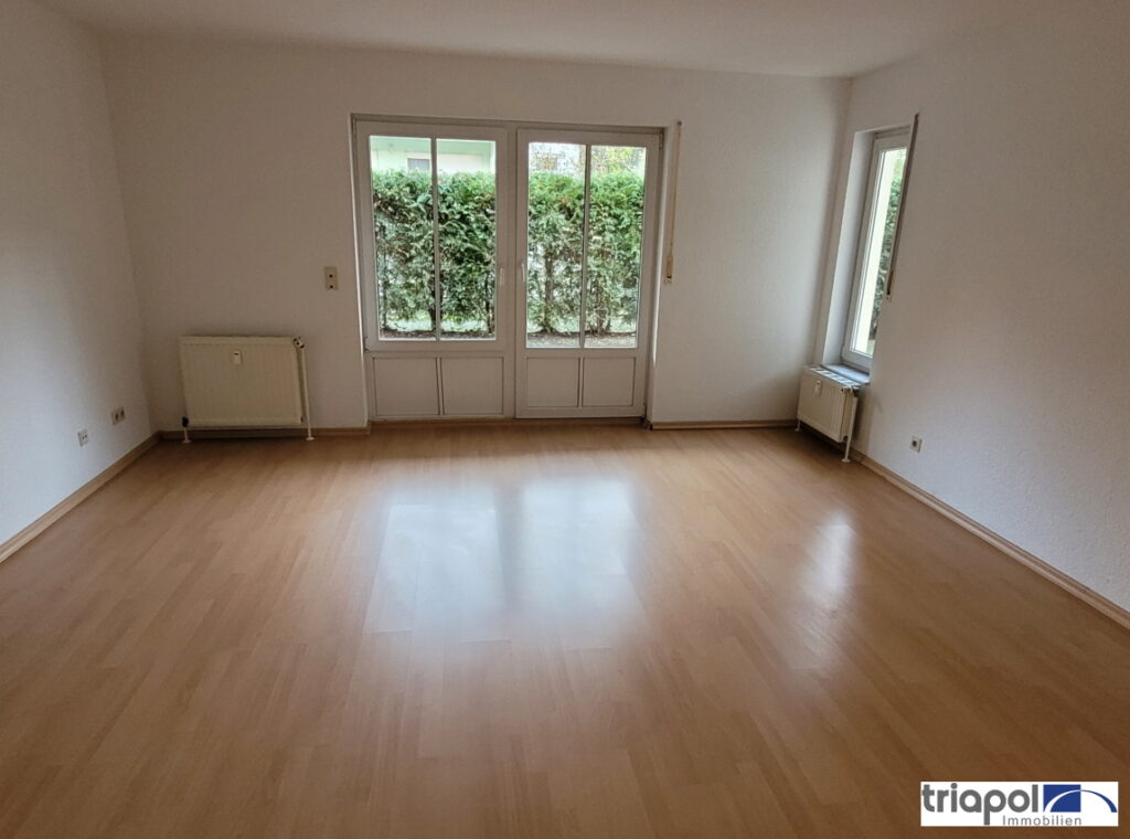 Schöne 2-Zi-Whg. mit TG-Stellplatz, Terrasse und Gartenanteil in grüner und ruhiger Stadtrandlage.