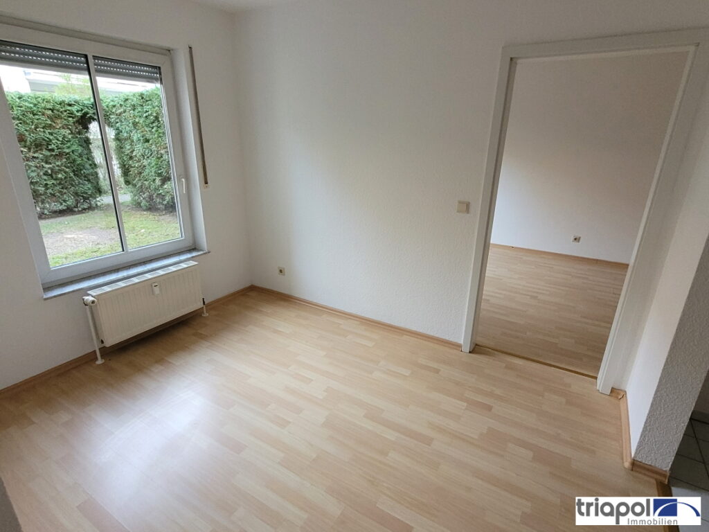 Schöne 2-Zi-Whg. mit TG-Stellplatz, Terrasse und Gartenanteil in grüner und ruhiger Stadtrandlage.