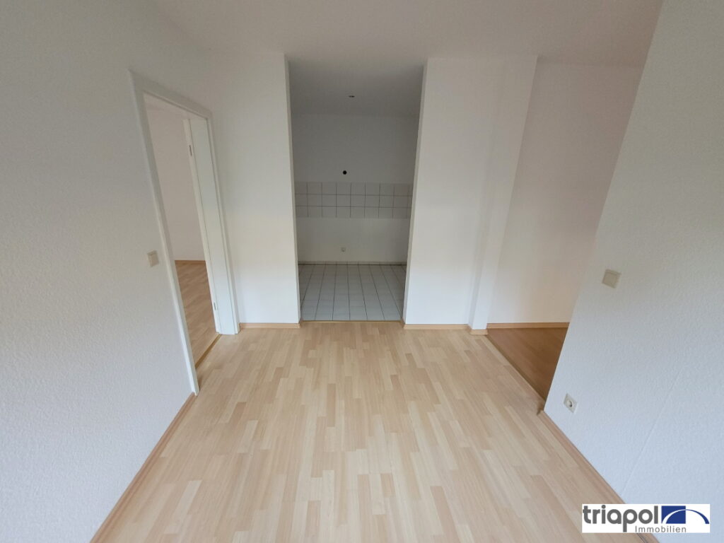 Schöne 2-Zi-Whg. mit TG-Stellplatz, Terrasse und Gartenanteil in grüner und ruhiger Stadtrandlage.