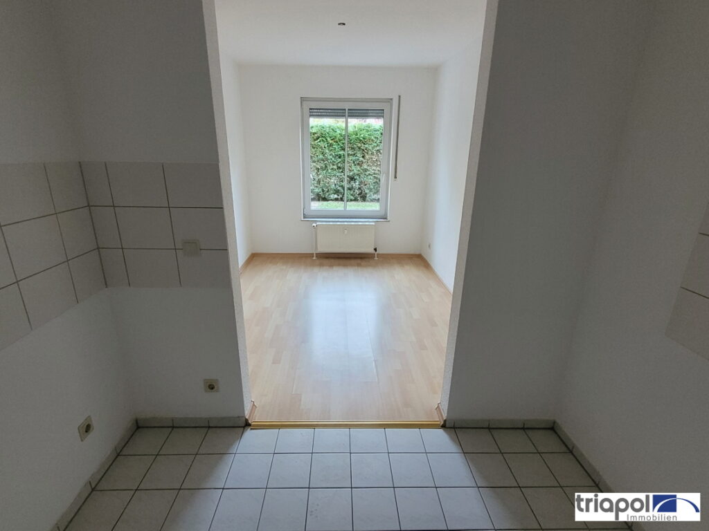 Schöne 2-Zi-Whg. mit TG-Stellplatz, Terrasse und Gartenanteil in grüner und ruhiger Stadtrandlage.