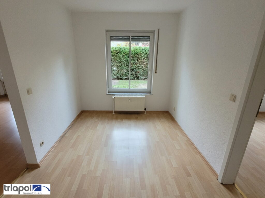 Schöne 2-Zi-Whg. mit TG-Stellplatz, Terrasse und Gartenanteil in grüner und ruhiger Stadtrandlage.