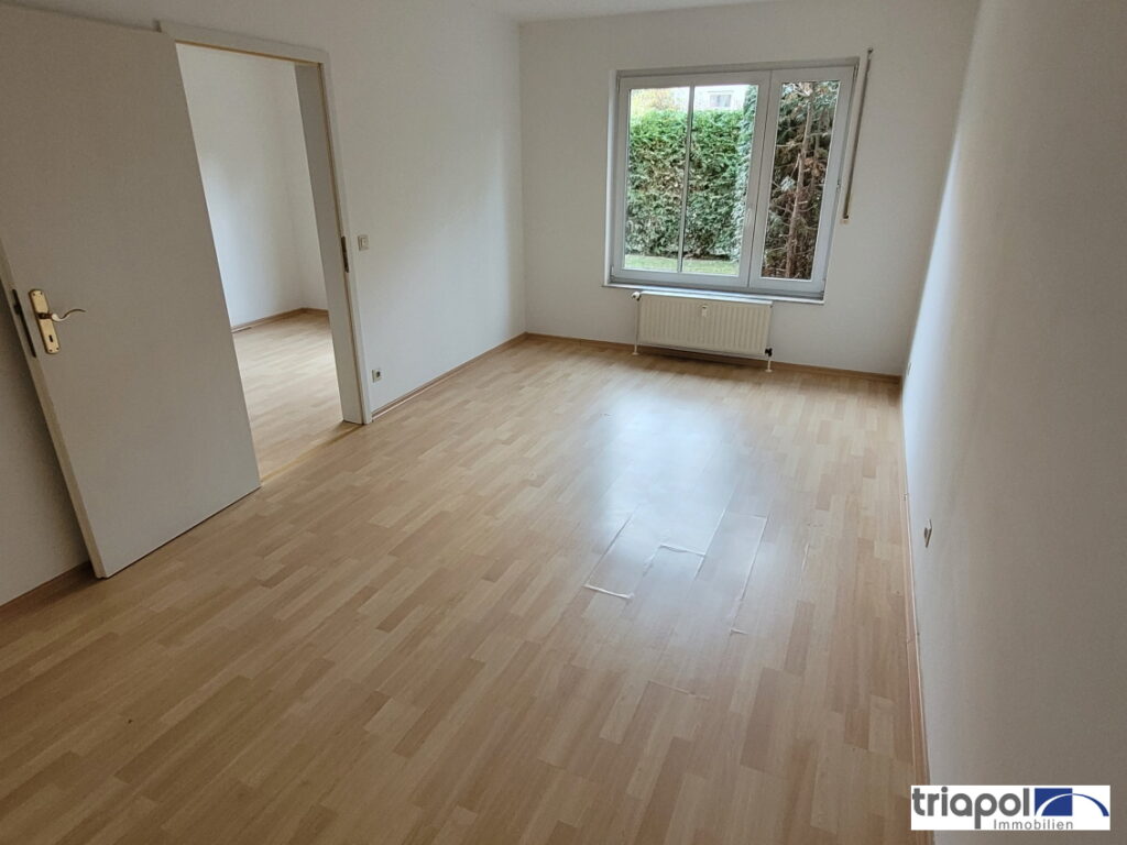 Schöne 2-Zi-Whg. mit TG-Stellplatz, Terrasse und Gartenanteil in grüner und ruhiger Stadtrandlage.