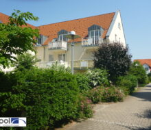 Ruhig und grün gelegene Maisonettewohnung mit Schlafgalerie und Balkon im Dachgeschoss.
