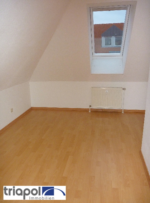 Gemütliche Dachgeschosswohnung mit 2 Balkone in grüner und ruhiger Stadtrandlage.