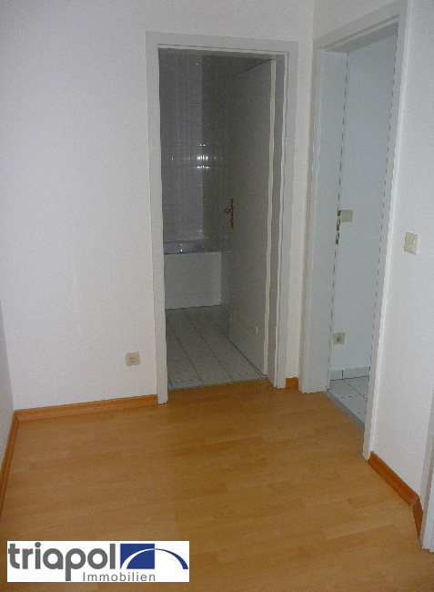 Gemütliche Dachgeschosswohnung mit 2 Balkone in grüner und ruhiger Stadtrandlage.