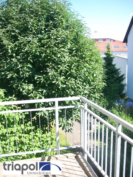 Gemütliche Eigentumswohnung mit Balkon und Laminatboden in ruhiger Stadtrandlage.
