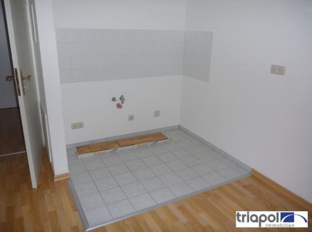 Hübsche 1-Zi-Wohnung mit Laminatboden und Balkon in ruhiger und grüner Lage.