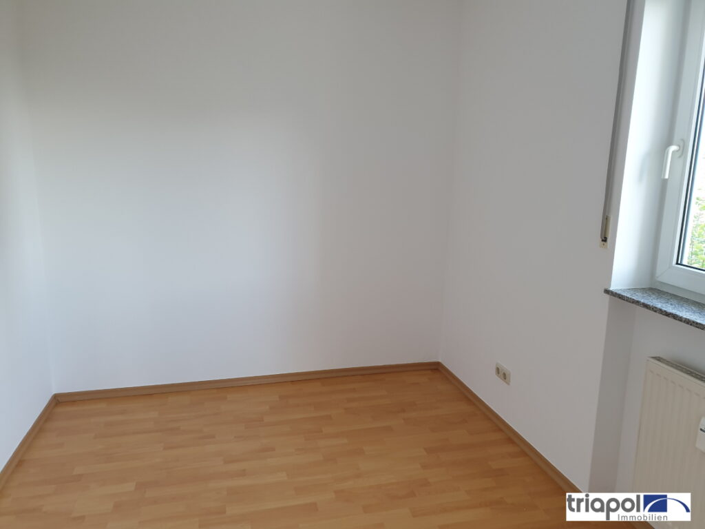 Gemütliche und helle Eigentumswohnung mit Balkon und Tiefgaragenstellplatz in ruhiger und grüner Lage.