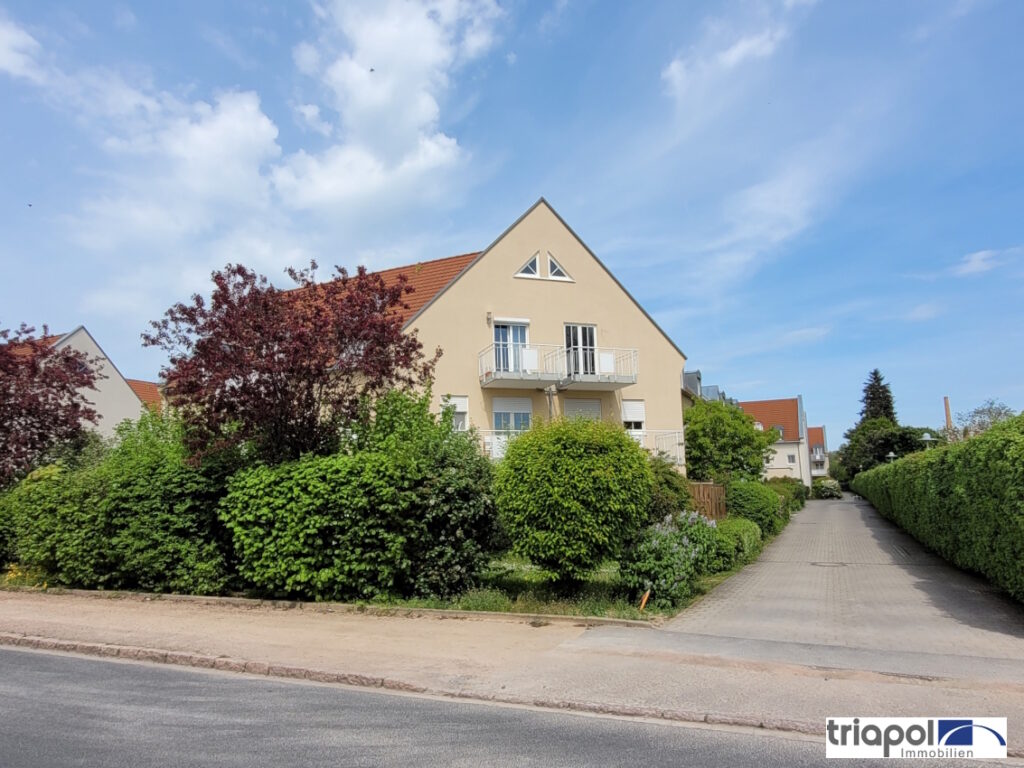 Gemütliche und helle Eigentumswohnung mit Balkon und Tiefgaragenstellplatz in ruhiger und grüner Lage.