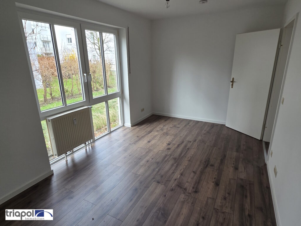 Schöne und ruhig gelegene Erdgeschoss mit neuem Laminatboden, Terrasse und kl. Gartenanteil in Coswig.