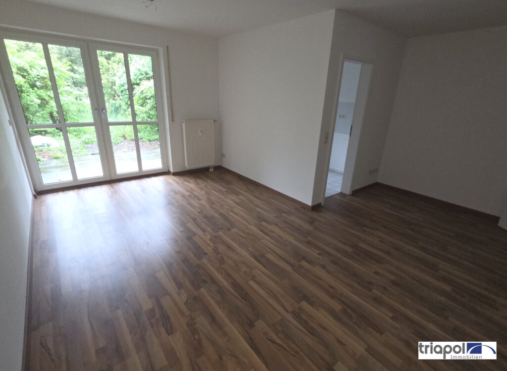 Gemütliche 1-Zi-Whg. mit Gartenterrasse und Tiefgarage in grüner Lage.